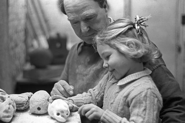 <p>Moore in the workshop with his daughter Mary</p>
